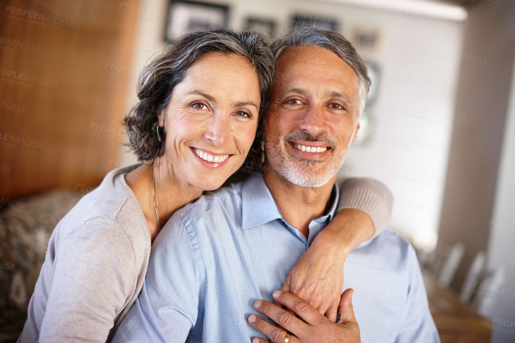 Buy stock photo Cropped shot of a mature couple indoors