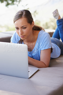 Buy stock photo House, remote work and woman on sofa with laptop for working from home, freelance job and career.  Business, startup and person on computer for typing email, planning or internet research on website