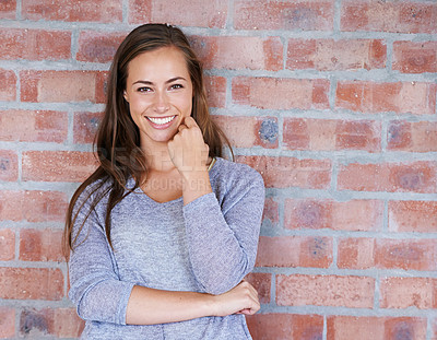 Buy stock photo Brick wall, leaning and portrait of woman with smile for scholarship to university in USA. Background, student and female person with happiness in campus of academy, gen z and girl back to school
