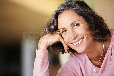 Buy stock photo Closeup portrait of a smiling woman leaning her head against her hand