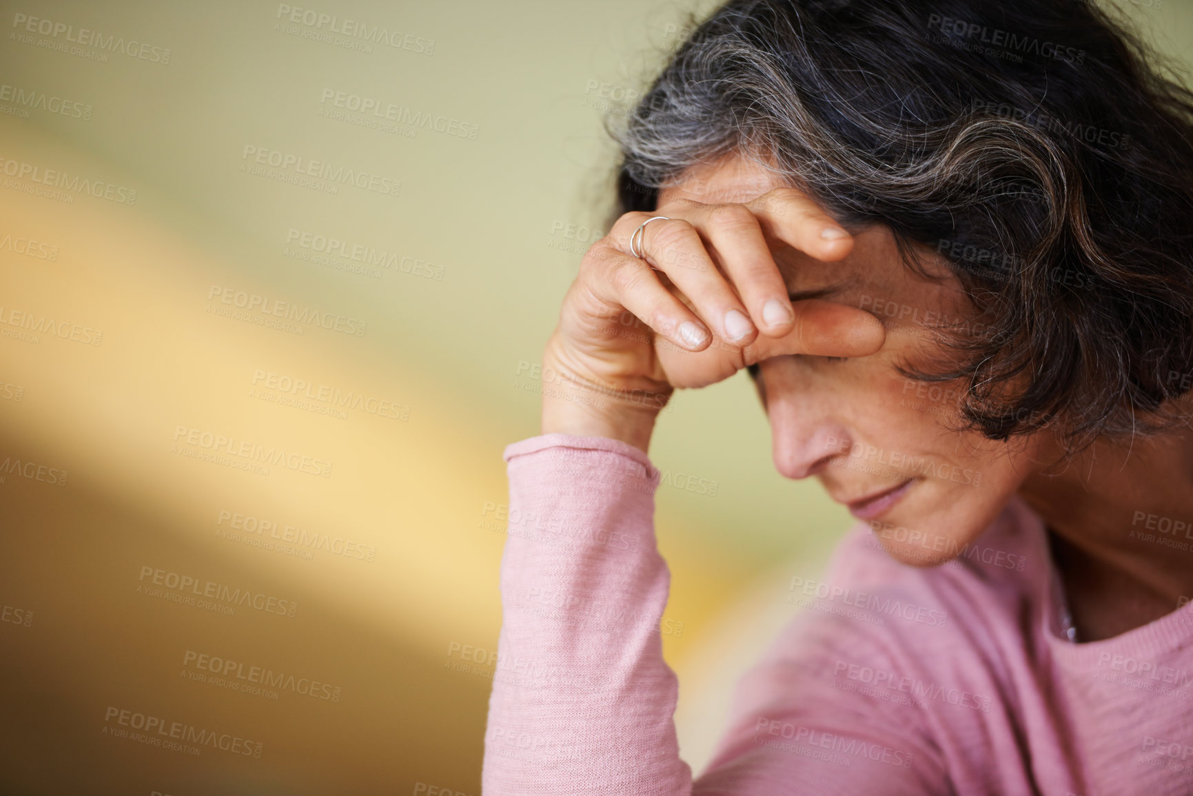 Buy stock photo Home, stress and senior woman with headache, anxiety and retirement with fatigue and tired in a lounge. Old person, pensioner or elderly lady with a migraine or medical problem with crisis or burnout