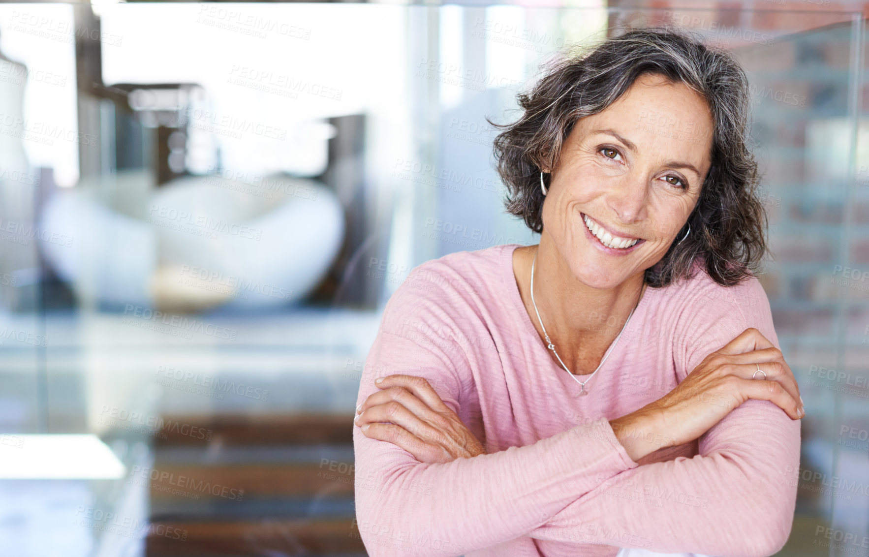 Buy stock photo Portrait of a mature woman sitting indoors