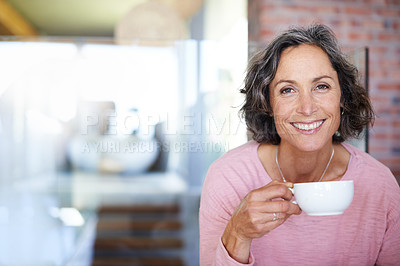 Buy stock photo Portrait of a mature woman drinking coffee