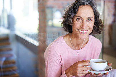 Buy stock photo Mature woman, home and smile with coffee to relax on day off and leisure. Female person, holiday and happy in living room with cup of tea for lunch on break, chill and self care in portrait.