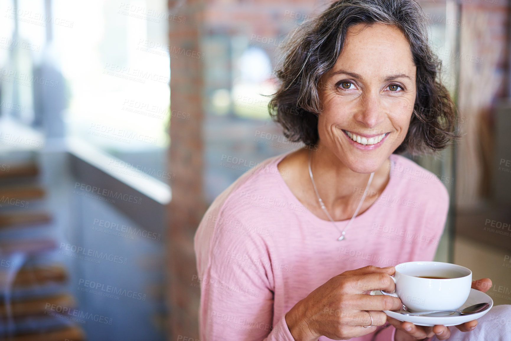 Buy stock photo Mature woman, home and smile with coffee to relax on day off and leisure. Female person, holiday and happy in living room with cup of tea for lunch on break, chill and self care in portrait.