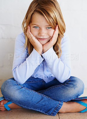 Buy stock photo Portrait, children and girl in house happy, calm or chilling on a floor alone on the weekend against wall background. Child development, youth and face of curious kid relax at home while daydreaming