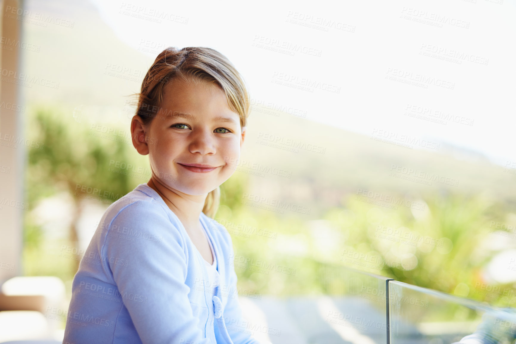 Buy stock photo Female kid, smile and portrait outdoor for development or growth, sunshine or natural air on holiday. Girl, child and happy at family house and relaxed or resting, vacation in America or Montana