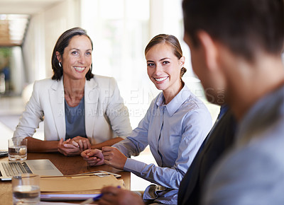 Buy stock photo Teamwork, women or happy business people in meeting, discussion, conversation in boardroom office. Smile, colleagues talking or confident employees planning strategy, feedback report or group project