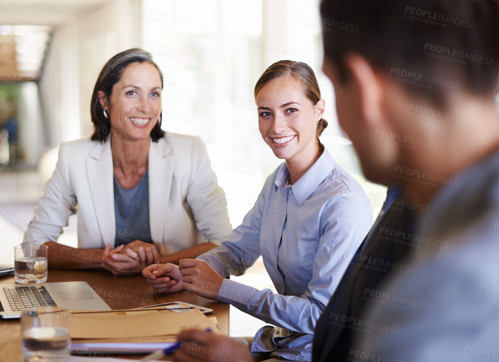Buy stock photo Teamwork, women or happy business people in meeting, discussion, conversation in boardroom office. Smile, colleagues talking or confident employees planning strategy, feedback report or group project