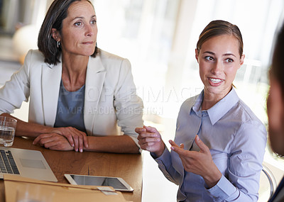 Buy stock photo Teamwork, women or business people in meeting, conversation or discussion in boardroom office. Listening, colleagues talking or female employees planning strategy, feedback report or group project