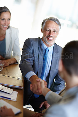 Buy stock photo Shaking hands, meeting and business people in office for teamwork, partnership or collaboration in boardroom. Introduction, recruitment and handshake for negotiation, agreement or company onboarding