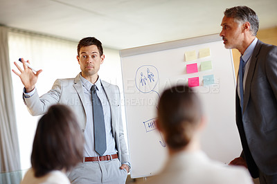 Buy stock photo Professional man, business and presentation of strategy for company in staff meeting with confidence, boardroom and manage team. Male person, workplace and communicate ideas with colleagues.