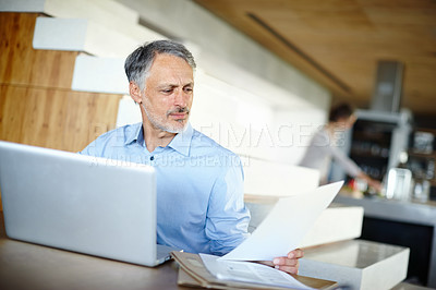 Buy stock photo Mature, businessman and laptop for remote work with document and reading or online research for project. Entrepreneur, computer and paperwork on startup company and learning for small business growth