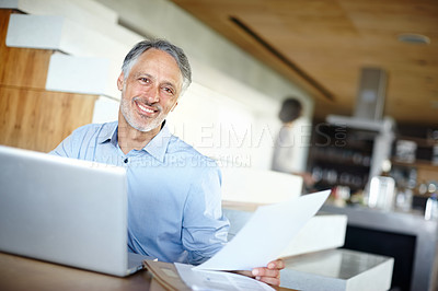 Buy stock photo Laptop, businessman and portrait for remote work with paperwork and reading or online research for project. Mature person, entrepreneur or document on startup company or pc for small business growth