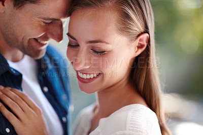 Buy stock photo Touch, couple and forehead in embrace for love, marriage and romance or care in outdoors. People, hug and bonding or relax for pride in relationship or commitment, loyalty and connection on date