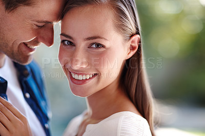 Buy stock photo Touch, couple and forehead in portrait for love, marriage and romance or care in outdoors. People, smile and bonding or relax for pride in relationship or commitment, loyalty and connection on date
