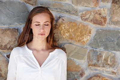 Buy stock photo Woman, wall and calm to relax for zen with eyes closed to breathe for wellness or mental health and mind to body connection. Female person, peace and mindfulness for meditation or stress relief