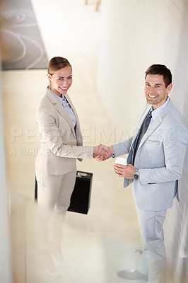 Buy stock photo Top view, greeting or business people shaking hands in portrait for b2b negotiation, success or discussion. Smile, happy or worker with handshake to welcome an employee speaking of partnership deal