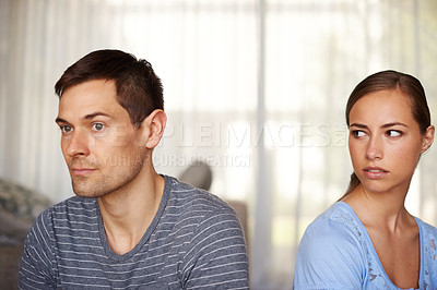 Buy stock photo Couple, bedroom and home with argument or stress, angry and sad with disappointment. Relationship, confrontation and partner or furious with matrimonial issues, conflict and emotional together