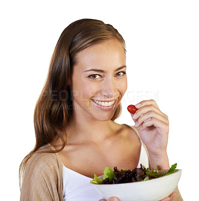 Buy stock photo Woman, studio and eating a salad in portrait for nutrition, healthy meal and white background. Female person, diet and fresh produce for vegan lunch, organic ingredients and vitamins or minerals