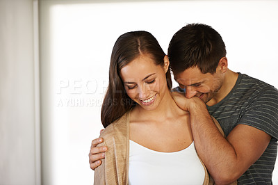 Buy stock photo Touch, couple and laugh in embrace for love, marriage and romance or care in home. Happy people, hug and humor or funny joke for pride in relationship or commitment, loyalty and connection on date