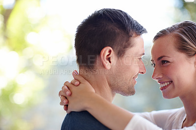 Buy stock photo Embrace, couple and smile for love in marriage, nature and romance or care in outdoors. People, hug and bonding or support for pride in relationship or commitment, loyalty and connection on date