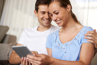 Buy stock photo Couple, man and woman with tablet, search and relax with vacation, booking and girlfriend in lounge of home. Hug, internet and female person browsing online for resort or hotel for date in holiday