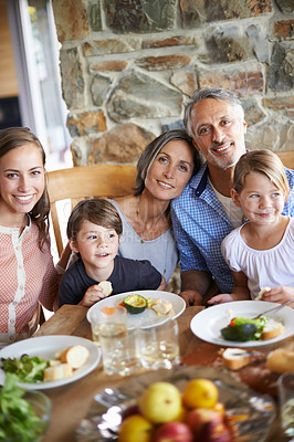 Buy stock photo Family, healthy and lunch table and food for eating, wellness snack with generations or grandparents together. Happy, home and nutrition or vitamins in meal for child, salad or fruits with beverage