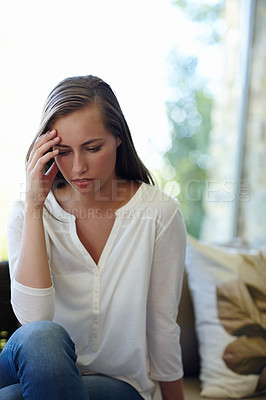 Buy stock photo Woman, thinking and stress for unemployment in home, mental health and depression for debt. Female person, anxiety and worry for financial loss or tax mistake, couch and distress for fail on sofa