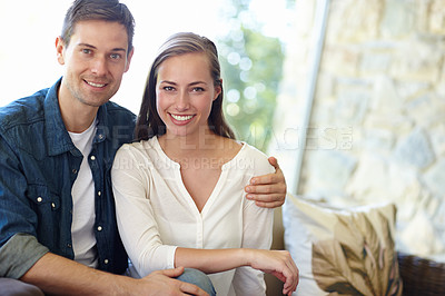 Buy stock photo Home, couple and portrait for love, embrace and romance or care on couch in living room. Happy people, relax and smile for pride in relationship or commitment, loyalty and connection on hug date