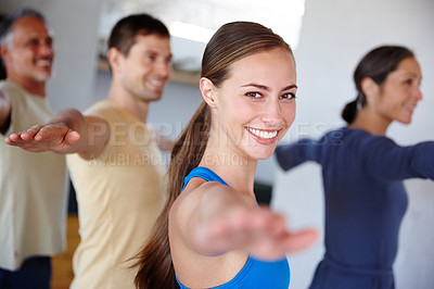 Buy stock photo A cropped portrait of a happy family doing yoga otgether
