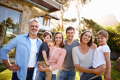 Buy stock photo Portrait, smile and family outdoor by home for love, bonding and care together at backyard. Happy parents, face and grandparents with kids at garden for connection with mother, father and children
