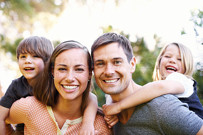 Buy stock photo Portrait of a happy young family of four