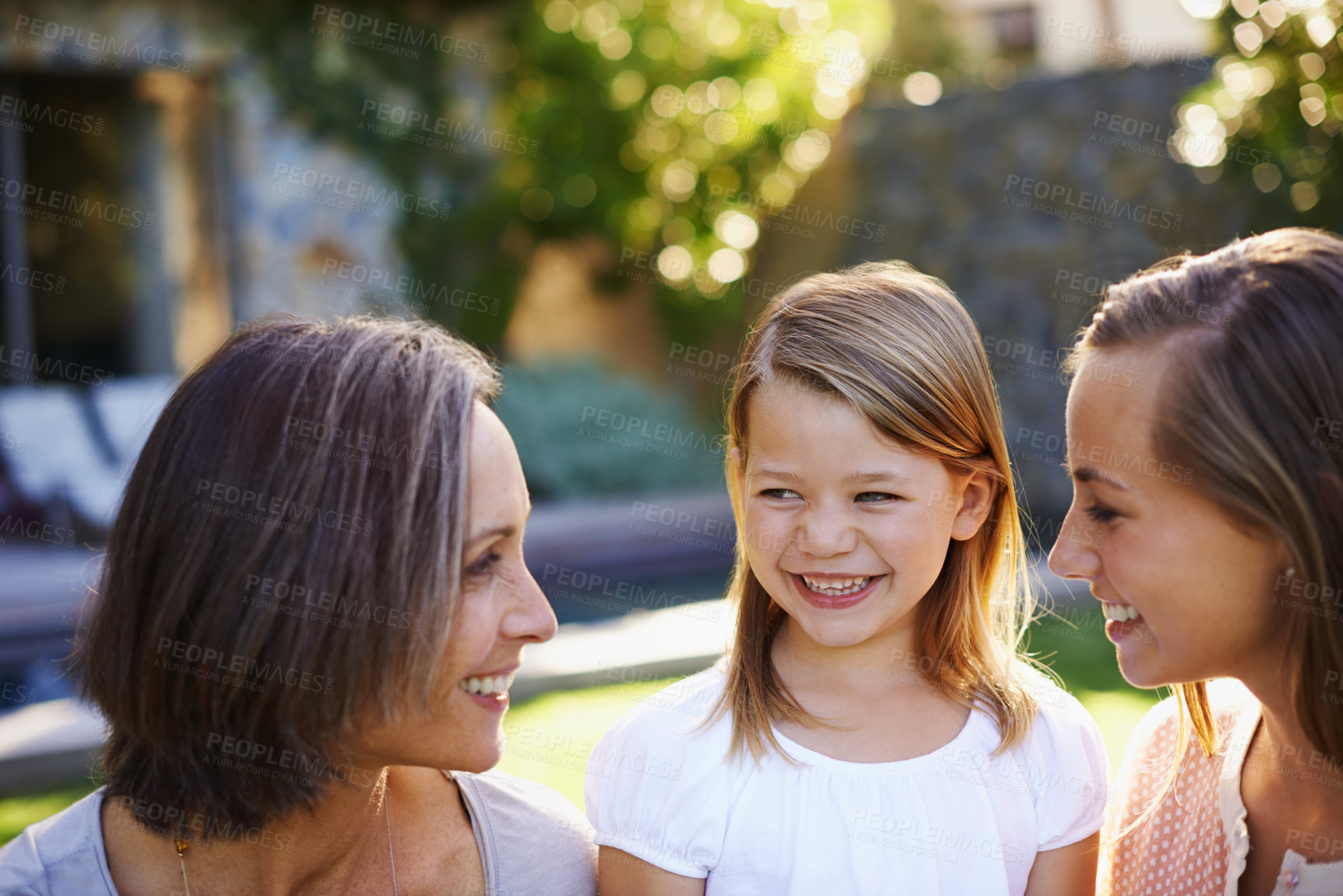 Buy stock photo Mom, grandmother and happy child with generations at family house with embrace, bonding and love with care in garden. Grandma, people and smile with kid in outdoors on vacation with nature for memory