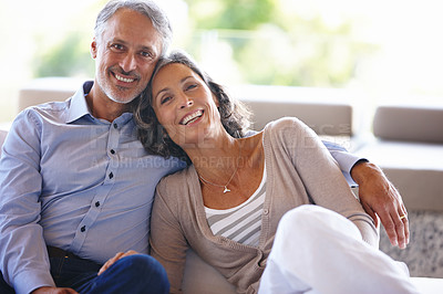 Buy stock photo Portrait, smile and senior couple on a couch, love and relationship with joy, home and happiness. Face, mature man and old woman on a sofa, retirement and cheerful with marriage, bonding and loving