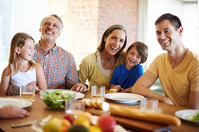 Buy stock photo Family, healthy and lunch table with food for eating, wellness snack with generations or grandparents together. Happy, home and nutrition or vitamins in meal for child, salad or fruits with beverages