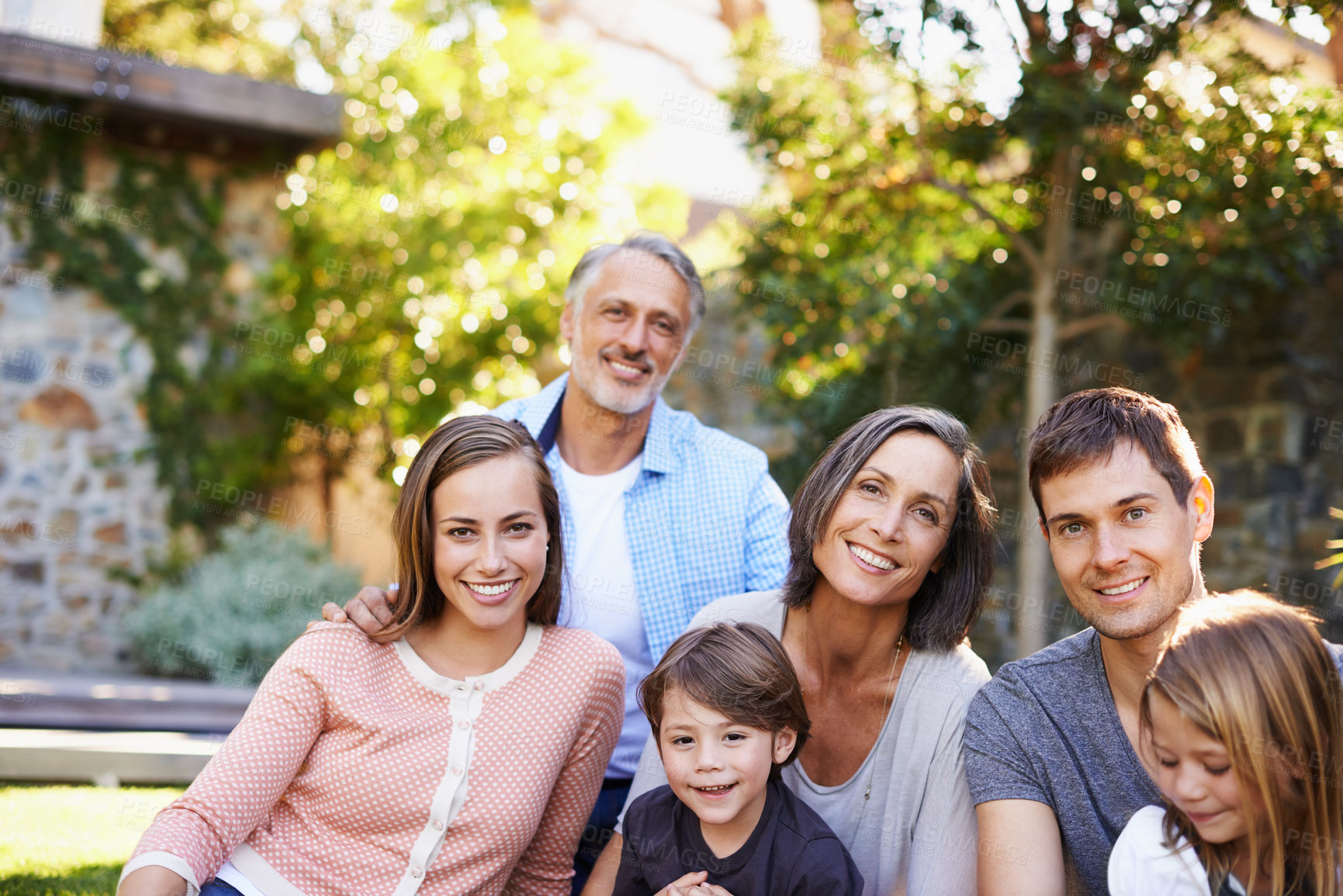 Buy stock photo Big family, happiness and portrait in backyard for love or bonding, care and memories together. Generations, garden and relax in summer for relationship growth or connection with unity and affection.