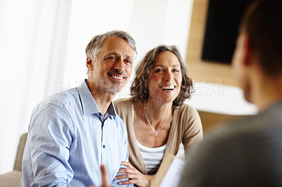 Buy stock photo Senior couple, smile and consultant paper for loan agreement, insurance policy or investment in living room. Man, woman and face with happiness for consultation, retirement planning and discussion