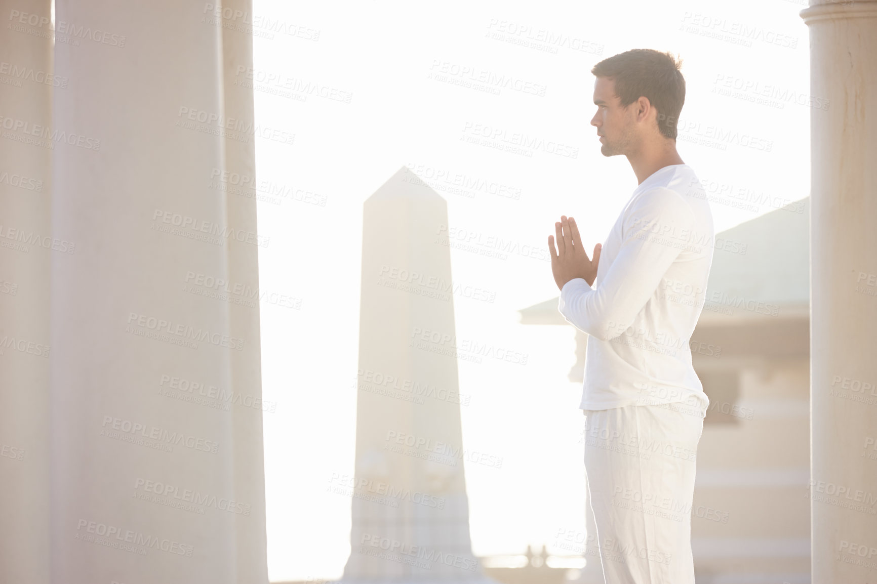 Buy stock photo Man, sun and meditation for yoga outdoor, zen and wellness with prayer hands for spiritual and holistic healing. Calm, peace and natural light with fresh air, mindfulness and energy balance for aura