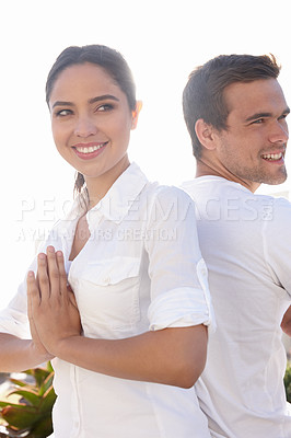 Buy stock photo Smile, prayer pose and couple at yoga retreat with meditation, peace and relax with mindfulness at outdoor resort. Zen, man and woman with holistic health, spiritual wellness and namaste with hands