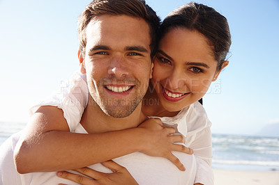 Buy stock photo Portrait, people or piggyback to love, beach or date on romantic getaway in summer trip to Sydney. Couple, man or woman to hug, relax or care on seaside holiday as weekend of bonding together