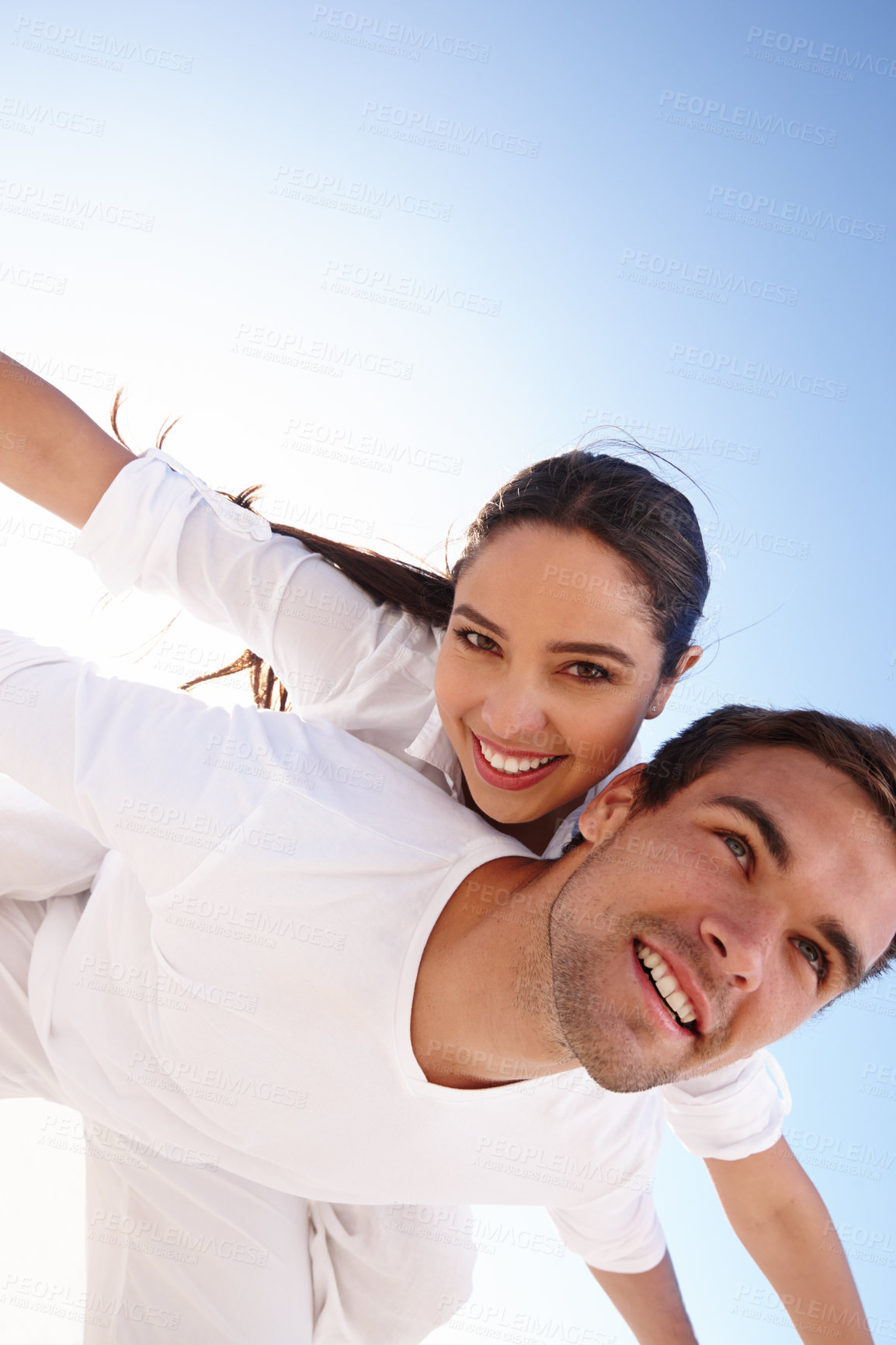 Buy stock photo Sky, piggyback or happy couple in portrait on outdoor date for care with support, loyalty or freedom. Romantic man, aeroplane or woman on holiday vacation to relax for wellness or love with mockup