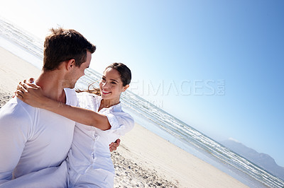 Buy stock photo Travel, carry or happy couple on a beach for holiday or love with support, loyalty or smile in outdoor nature. Sky mockup space, romantic man or woman on vacation to relax for wellness or anniversary