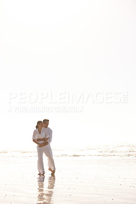 Buy stock photo Couple, hug and beach with love, vacation or summer holiday together for embrace or outdoor romance. Man and woman enjoying weekend or valentines day getaway by the ocean coast or sea on mockup space