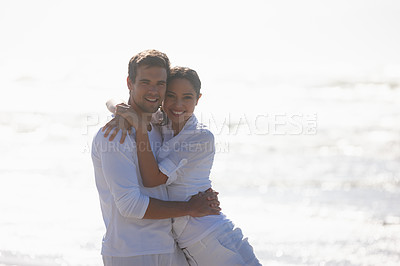 Buy stock photo Travel, hug and portrait of couple on beach for bonding, relax together and relationship by ocean. Dating, happy and man and woman embrace for romance on holiday, vacation and weekend in nature