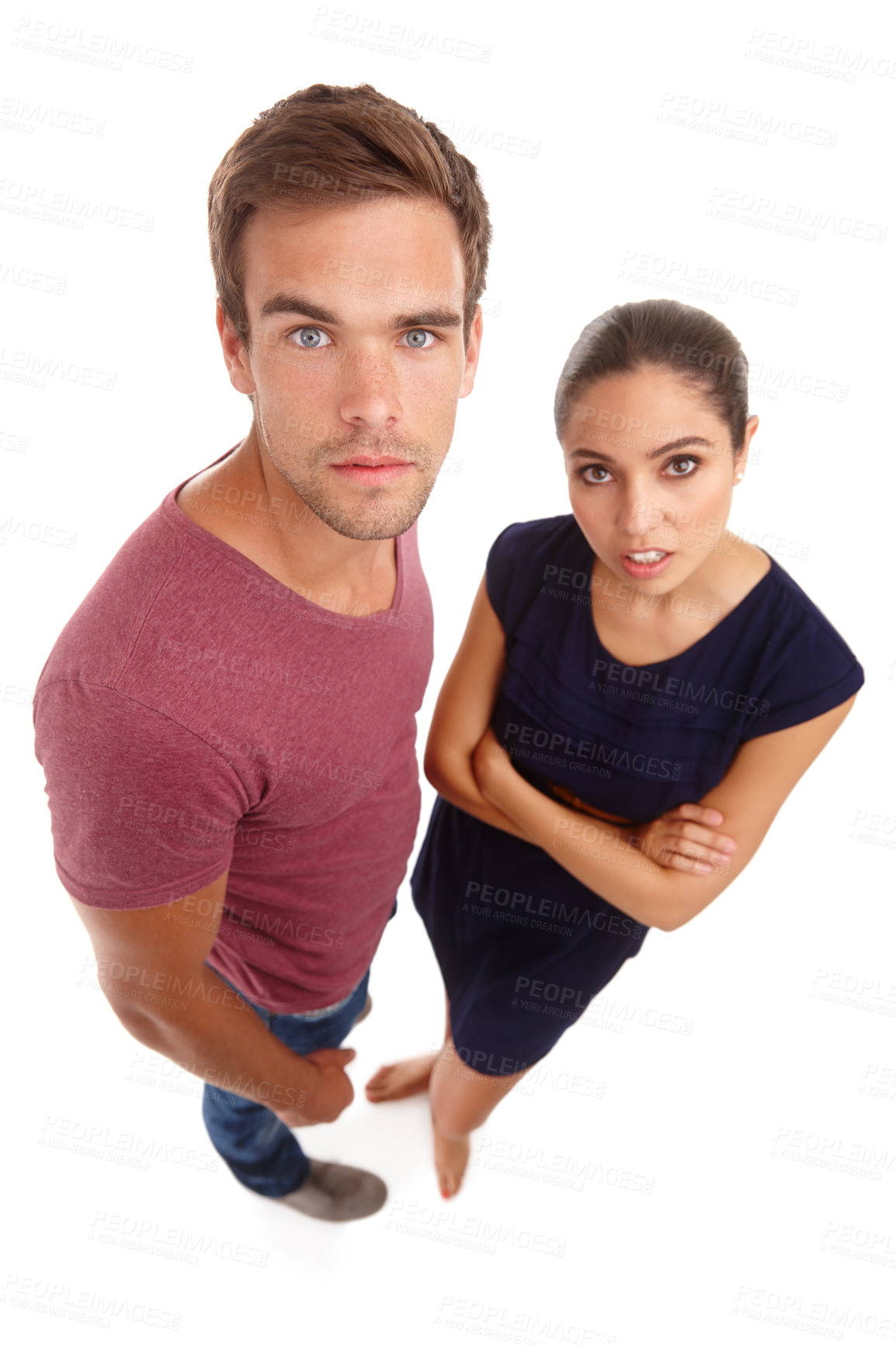 Buy stock photo Portrait, top view and annoyed couple in studio with aggressive, attitude or body language on white background. Frustrated, face and people moody with fake news, announcement or marriage counselling