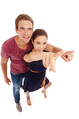 Buy stock photo Love, couple and hand pointing in studio for announcement, information or promotion on white background. Marriage, news and people show competition, offer and romantic valentines day giveaway deal