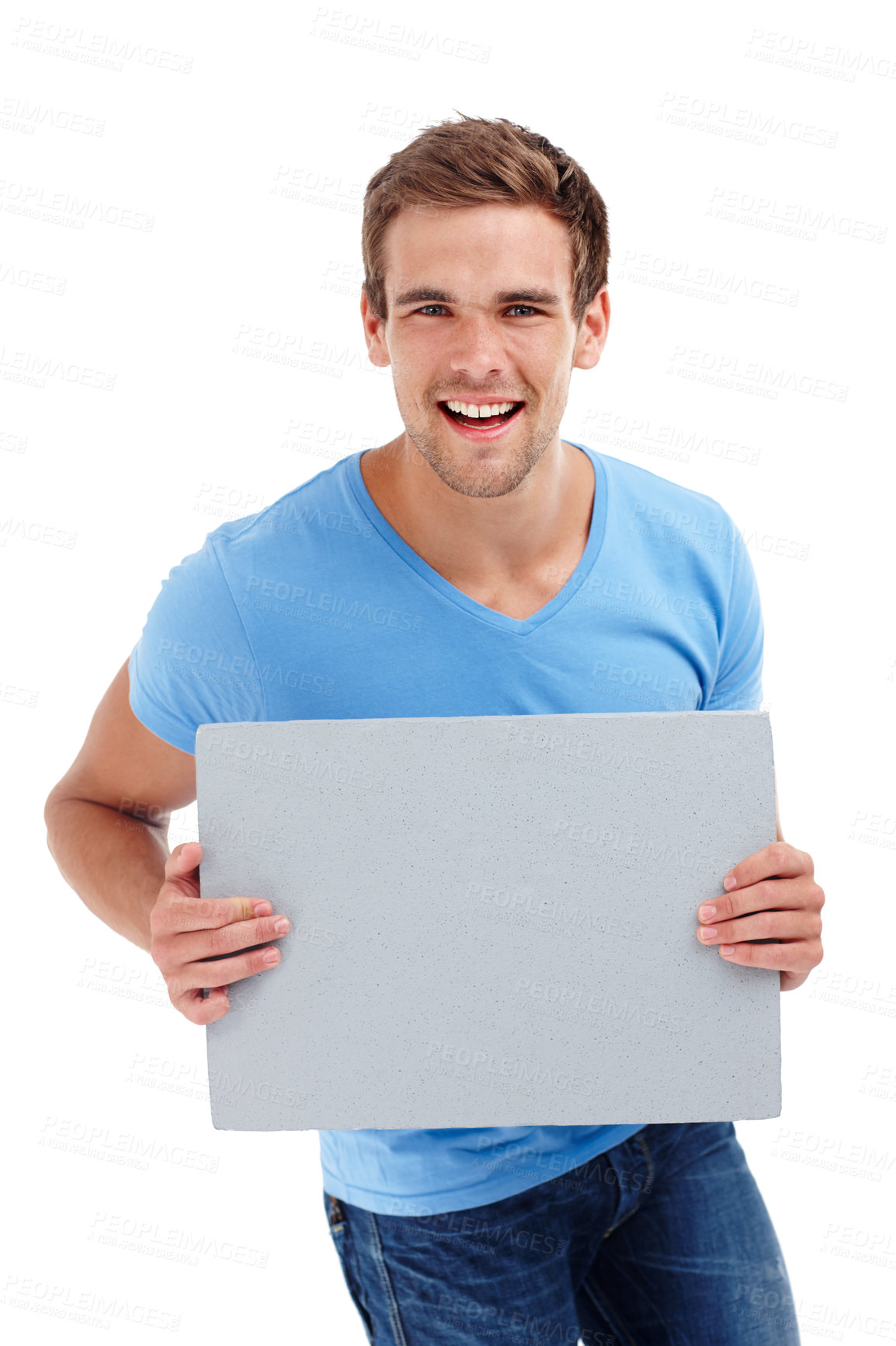 Buy stock photo Man, portrait and board in studio with poster for advertising space, presentation or promotion sign. Model, smile and cardboard for banner, announcement and mockup for information on white background