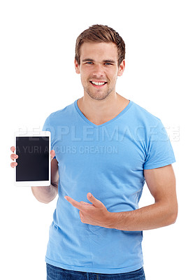 Buy stock photo Studio shot of a young man holding a digital tablet