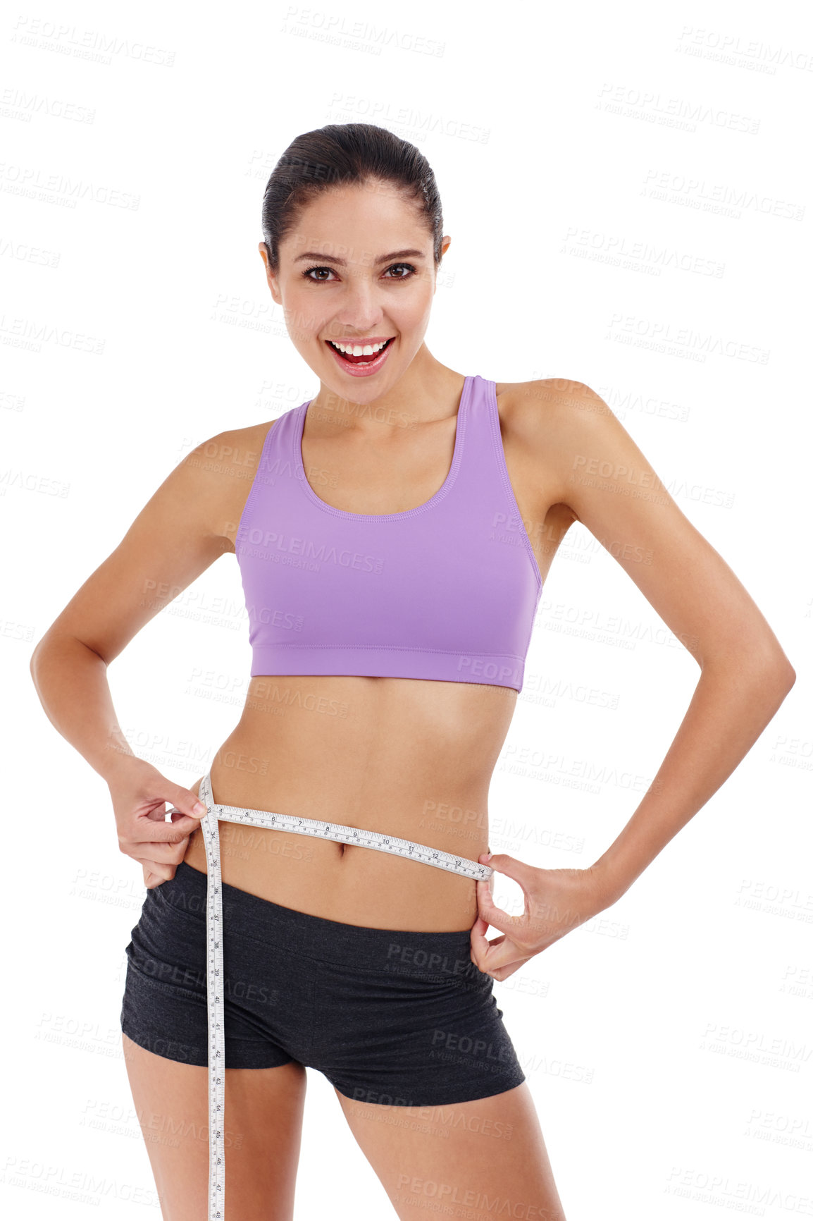 Buy stock photo Three quarter length shot of an attractive young woman in gym clothes measuring her waist